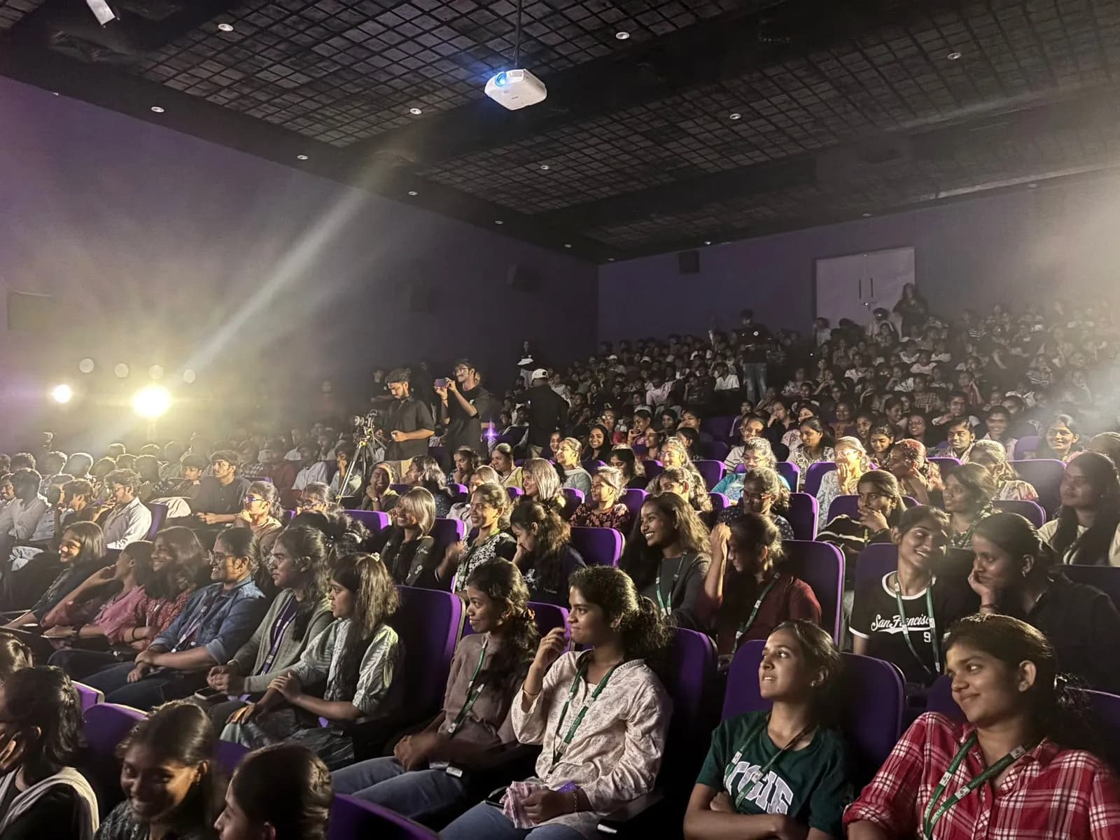 Audience gathered in the college auditorium